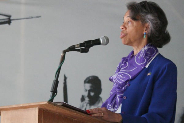 US Ambassador Mercia Bernicat turns over a leaf
