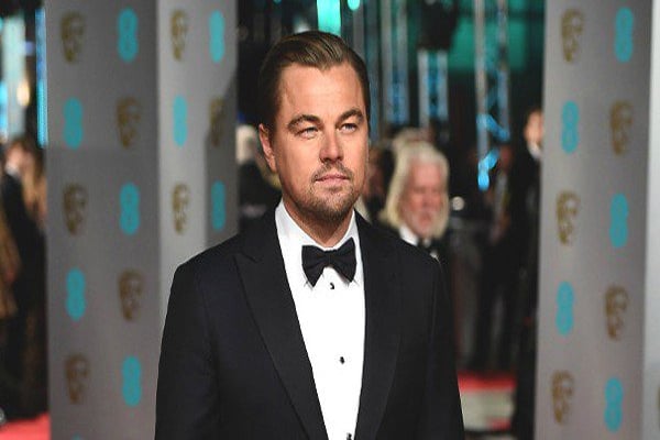 DiCaprio leaves party with three mystery girls in tow
