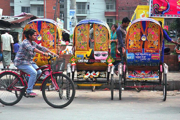 Colorful rickshaw paintings protest violence against women