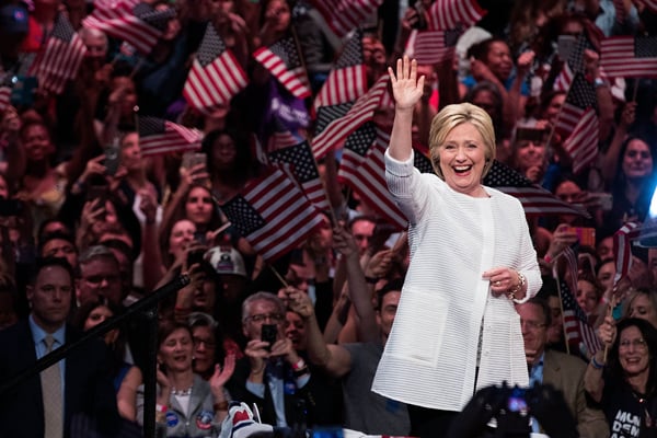 Victorious Clinton claims historic 'milestone' for women
