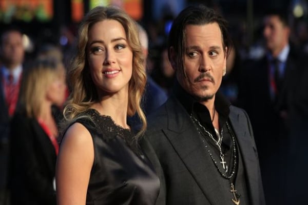 Amber Heard gives Johnny Depp's $7m divorce settlement to two charities