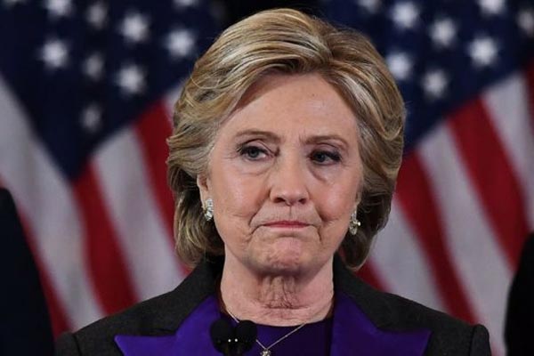 Clinton blames defeat on FBI director