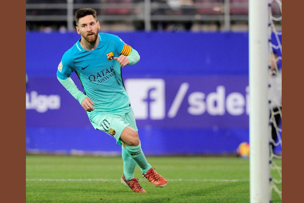 Barcelona, Sevilla maintain pressure on Madrid