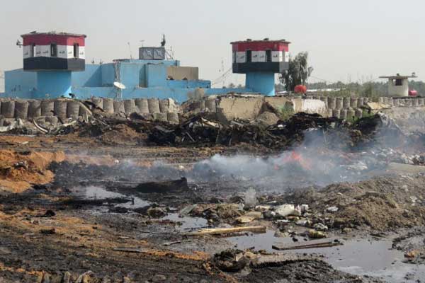 At least 14 dead in IS truck bomb at Baghdad