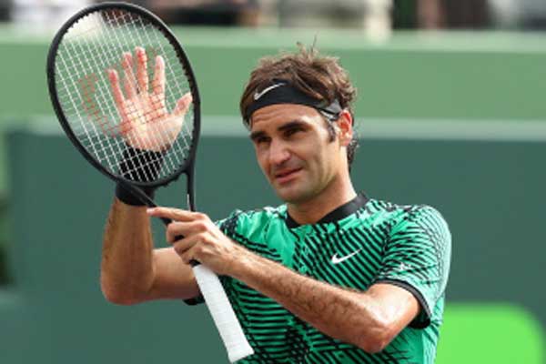 Federer, Wawrinka advance in Miami