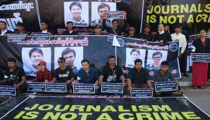 Myanmar police charge Reuters reporters under Official Secrets Act