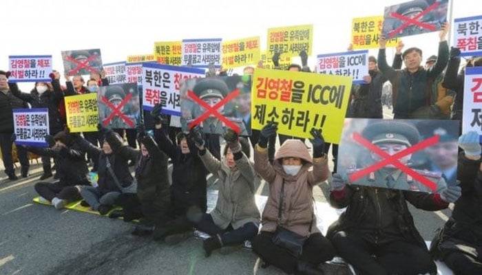 Protests greet North Korean delegation