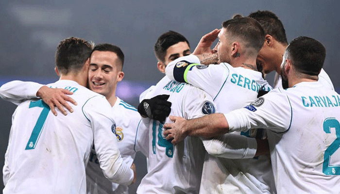 Real Madrid beats PSG 2-1 to reach Champions League quarters