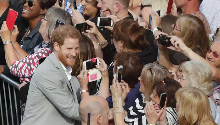 Windsor gears up for royal wedding, embraces Harry, Meghan