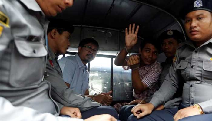 Myanmar court charges Reuters reporters with official secrets offense
