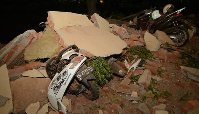 91 dead as powerful earthquake hits Indonesia