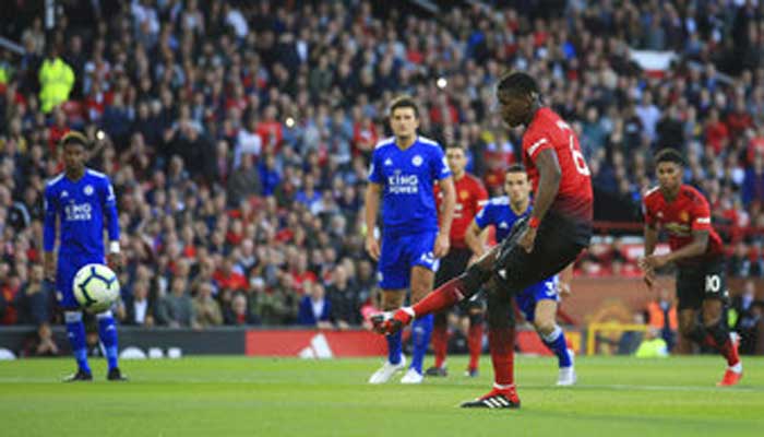 Pogba scores as Man United wins Premier League opener