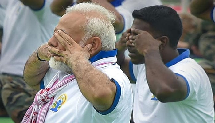 'Yoga for all, all for yoga,' says Modi