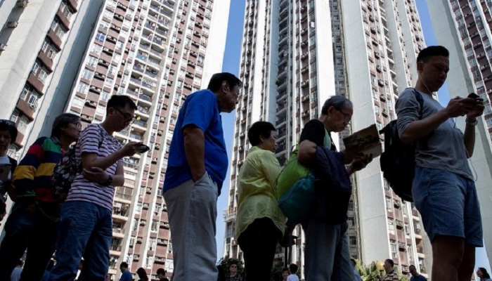 Hong Kongers go to polls as democracy camp seeks to send message