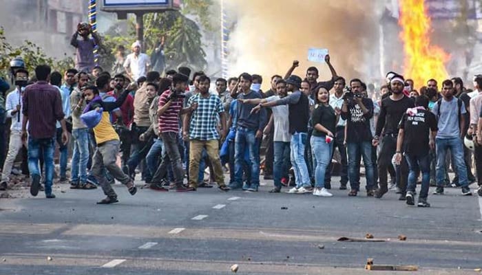 People defy curfew, police open fire as Assam turns war zone