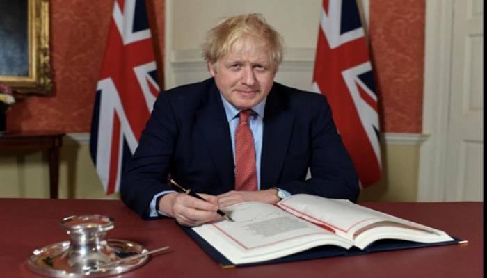 Johnson signs agreement for Britain to leave EU