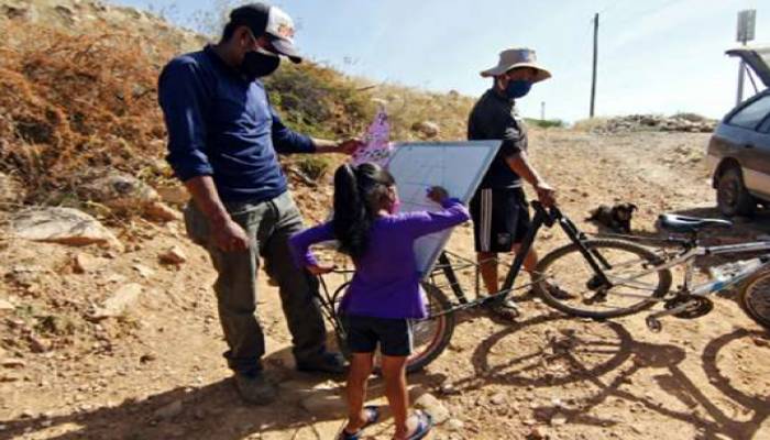 Bolivian teacher on a bike brings school to pupils
