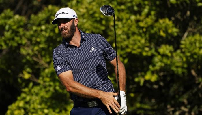 Record-breaking Johnson wins first Masters