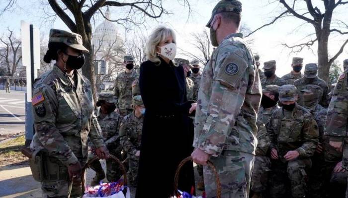 Biden apologises over troops sleeping in car park