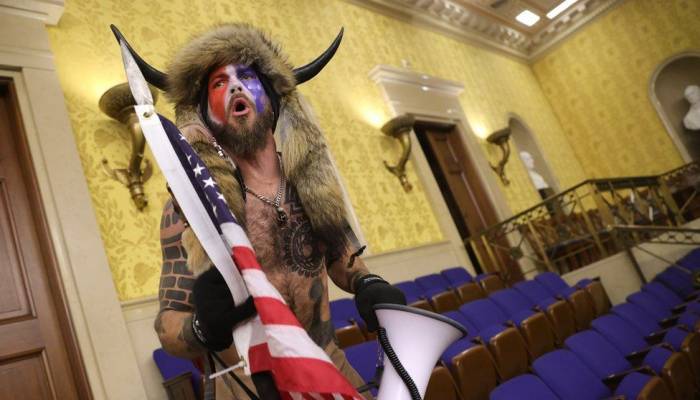 'QAnon Shaman' Jake Angeli charged over pro-Trump riots