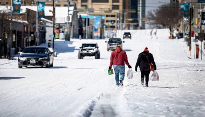 Frigid Arctic air, winter storms grip much of US