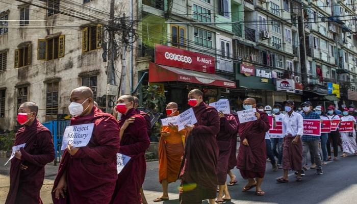 Trial for Aung San Suu Kyi begins in secret