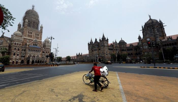 India reports record 152,879 new COVID-19 infections