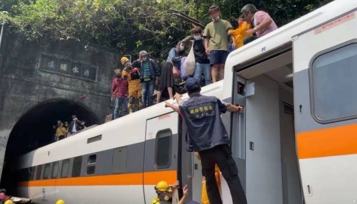 48 killed as train crashes and derails in Taiwan tunnel