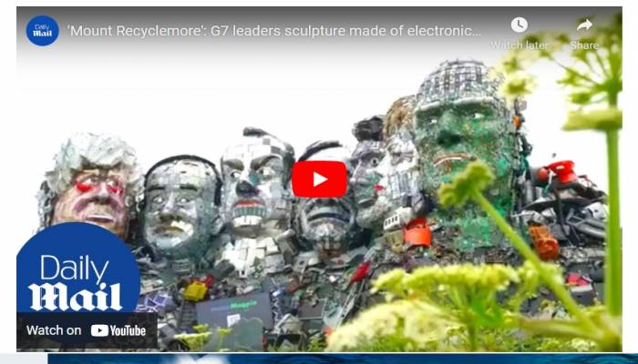 Artists create e-waste 'Mount Recyclemore' for G7