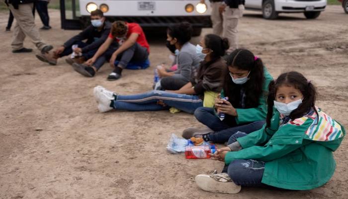 Biden administration violating decree on migrant children, court filing says