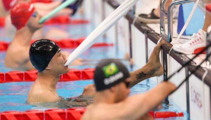 China's armless swimmer Zheng Tao dominates with four golds