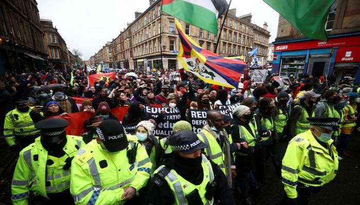 Thousands rally in rainy Glasgow for COP26 climate action