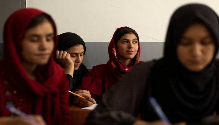 Female students join male peers as Afghan universities reopen