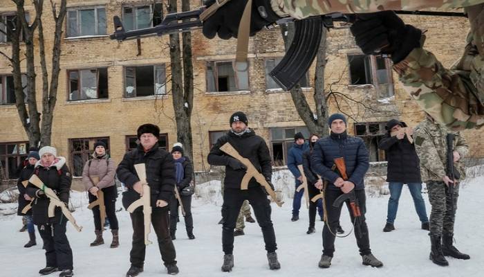 Ukraine hit by cyber attack as US questions Russian troop pullback