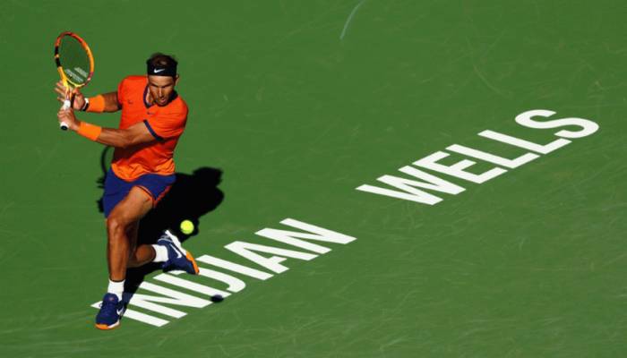 Nadal ekes out Indian Wells win as No. 1 Medvedev cruises