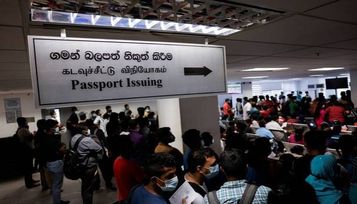 Battered by economic crisis, Sri Lankans seek passport to a better life