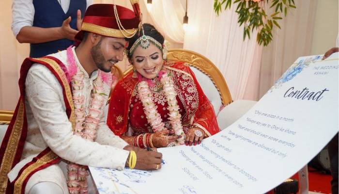 Assam: The India couple in 'one pizza a month' wedding contract