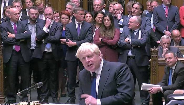 Boris Johnson clings on despite clamour for his resignation