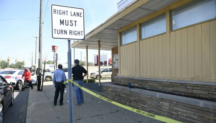 US manhunt after gunman shoots 3 people dead at 'random'