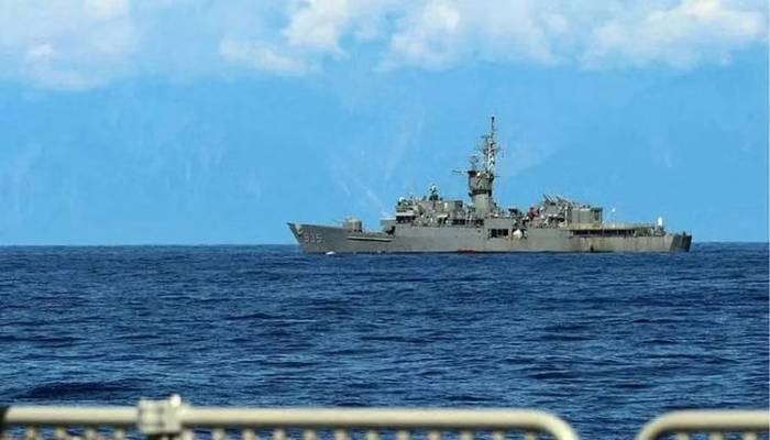 Chinese and Taiwanese warships eye each other as drills due to end