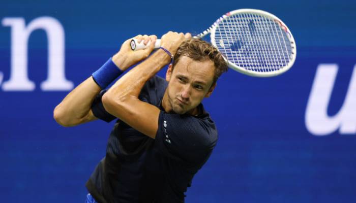 Medvedev storms into third round