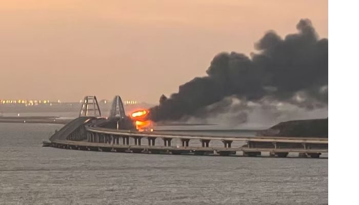 Truck explosion destroys part of Russia-Crimea bridge