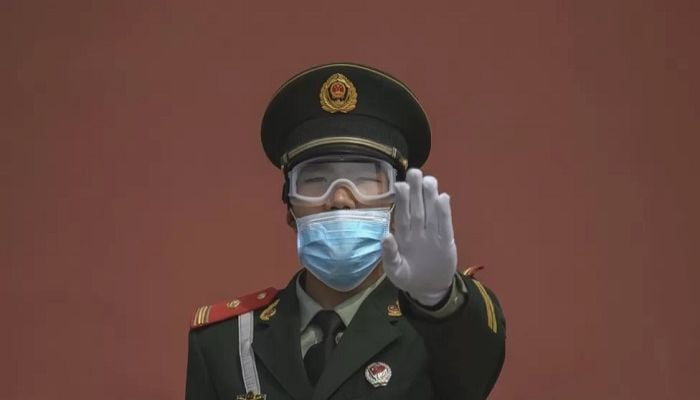 How many Covid cases does China have and what are its rules?