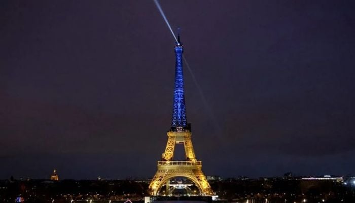 Eiffel Tower lights up in Ukraine colours