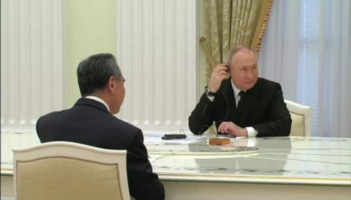 Putin meets top Chinese diplomat Wang Yi in Moscow
