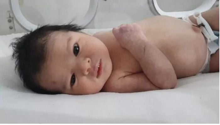 Thousands offer to adopt baby born under rubble