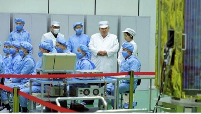 Kim inspects NKorea's first spy satellite: state media