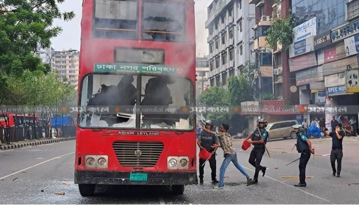 BNP-police clashes in Dhanmondi, BRTC bus torched