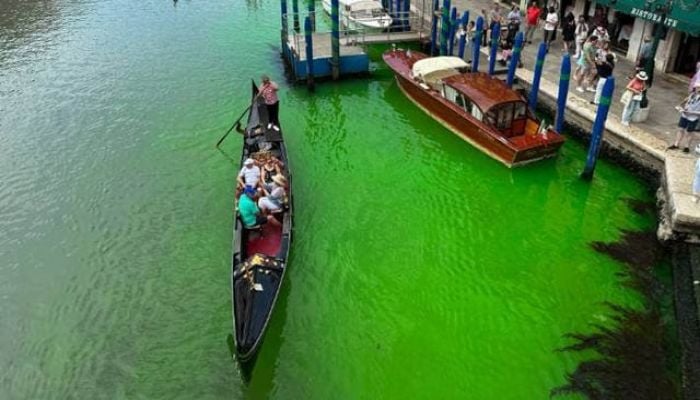 Venice's Grand Canal turns bright green due to fluorescein