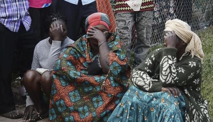 Uganda says 20 'collaborators' arrested over school attack